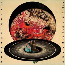 Album cover for A World of Masks [Limited Edition] [Splatter Vinyl] [Gatefold Cover] by The Heliocentrics